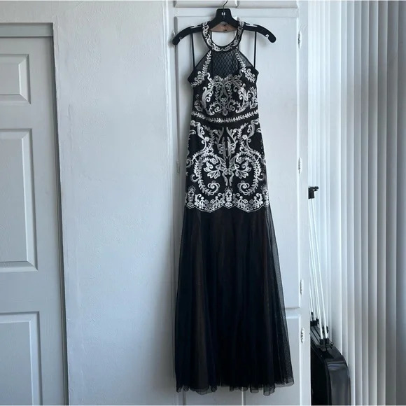 BCBG black and white embroidered halter with mermaid cut